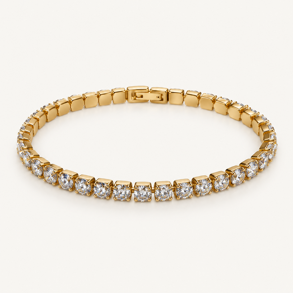 Gold-tone bracelet on an ivory background