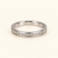 Simple silver-tone band on an ivory background