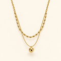 Double bead necklace on an ivory background
