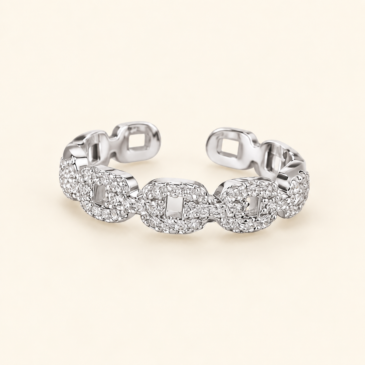 Justine adjustable ring on an ivory background