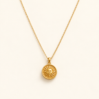 Kappa necklace on an ivory background