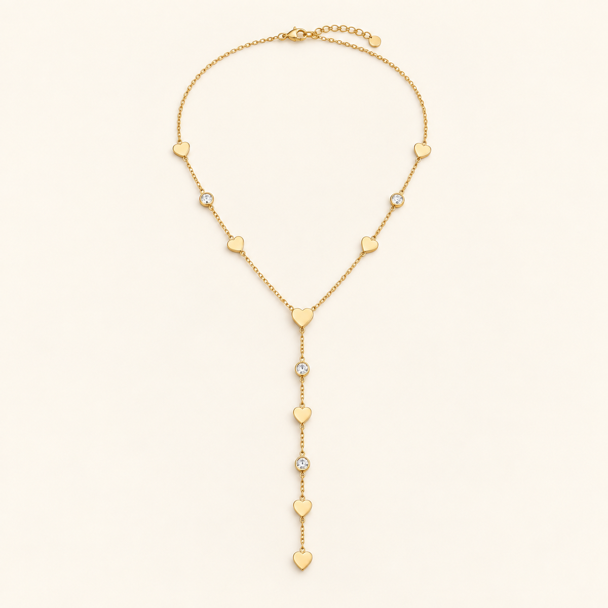 Nina necklace on an ivory background