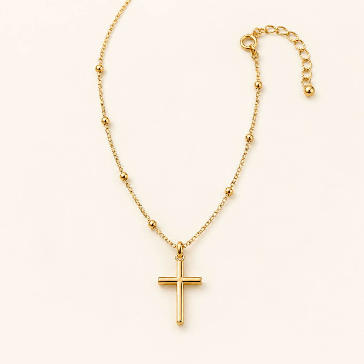 Simplicity cross necklace on an ivory background