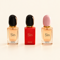 Inspired mini eau de parfum gift set on an ivory background