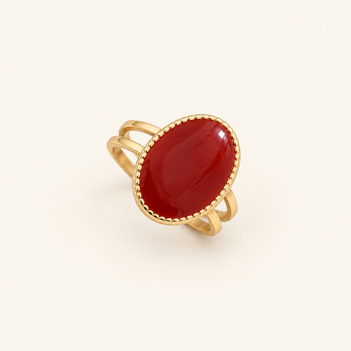 Capucine ring on an ivory background