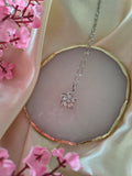 Collier fleur Strasse blanc